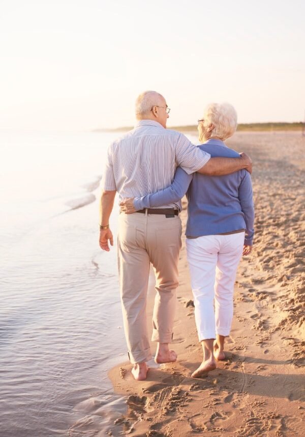 senior adults by the ocean